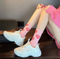 Calcetines con corazones de mujer de color rosa