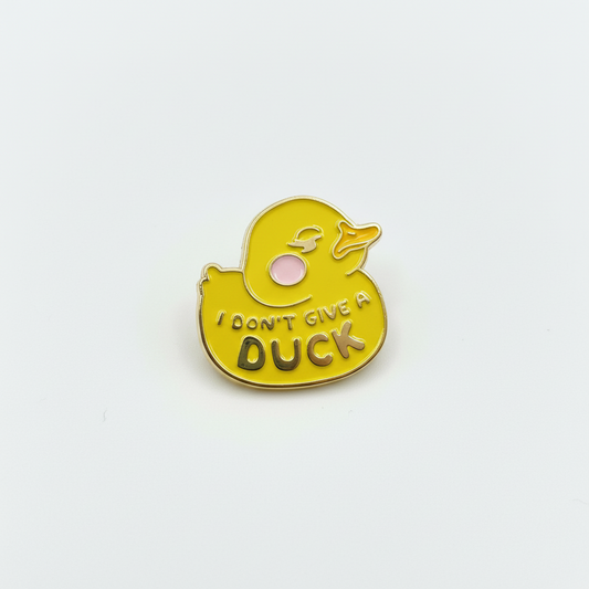 Pin’s Canard Jaune « I don’t give a Duck »