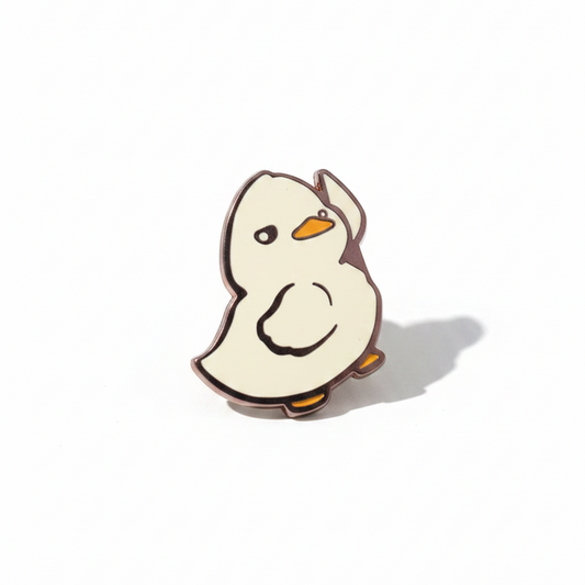 Pin's Canard Blanc avec Couteau
