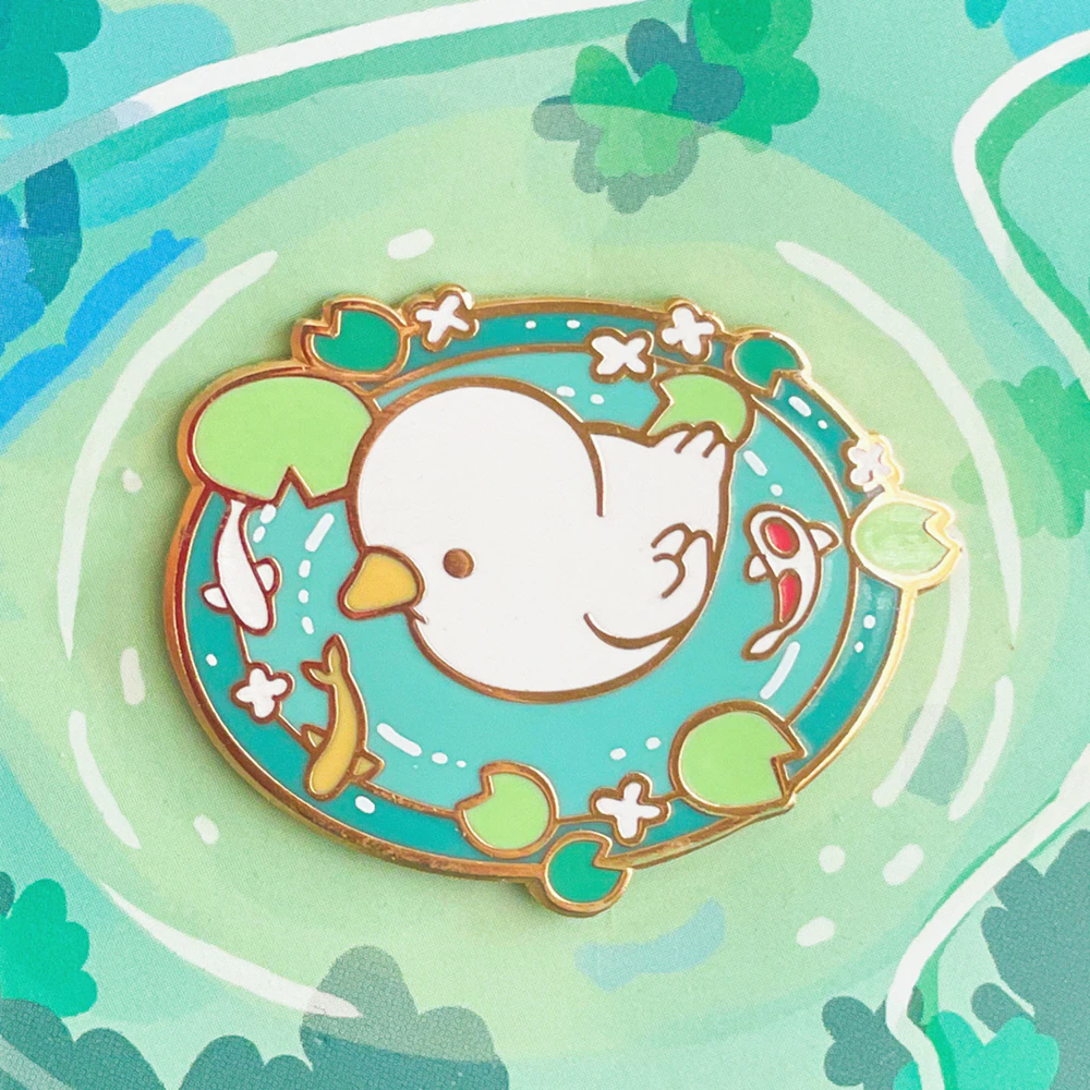 水上の白いアヒル