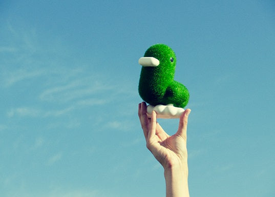 Grass duck piggy bank