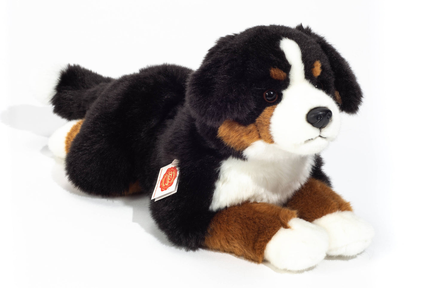 Peluche de perro de montaña bernés - Acostado