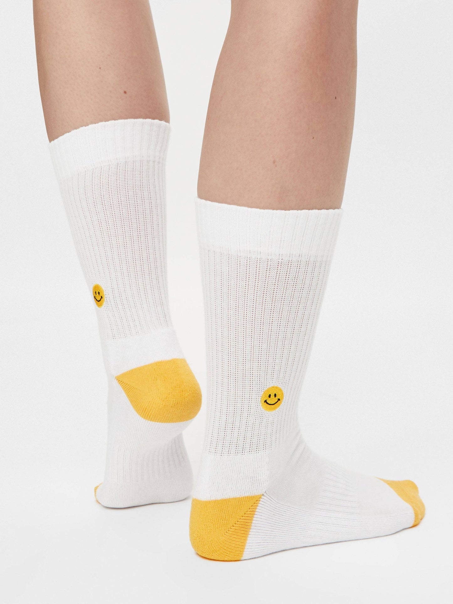 Calcetines con emoji sonriente