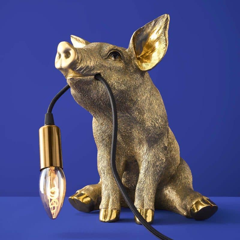 Lampada da tavolo a forma di maiale dorato