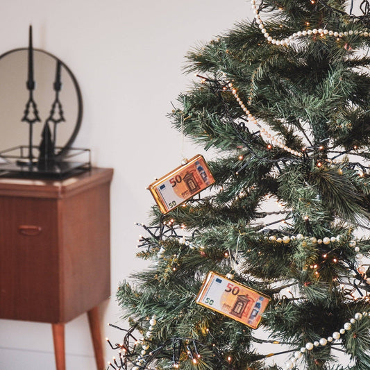 Billete de 50 euros con forma de bola de Navidad