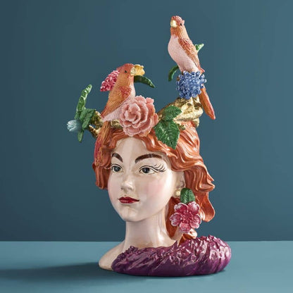 Vase with a woman's head by M. Parrots