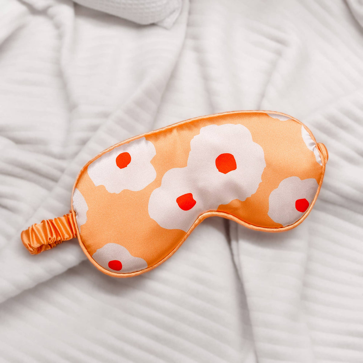 Máscara de dormir floral laranja