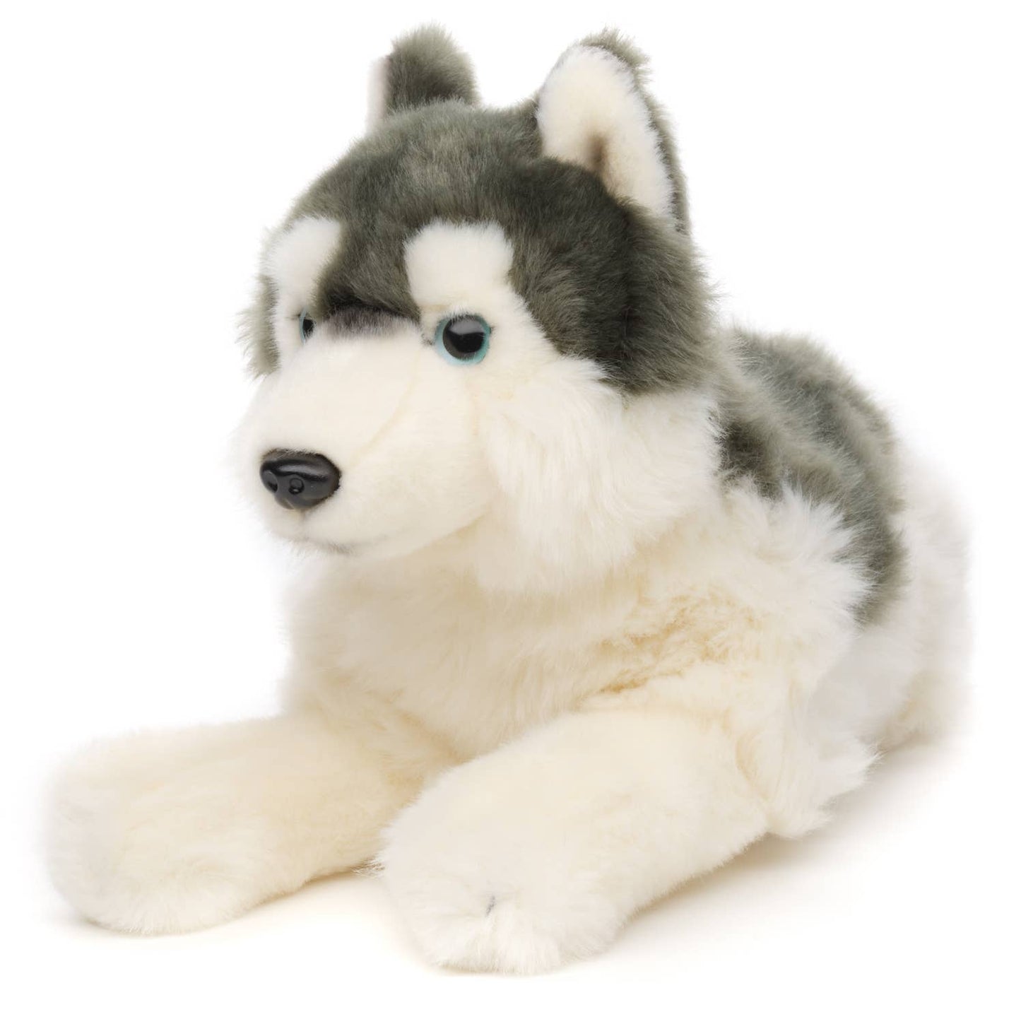 Peluche de husky gris, acostado