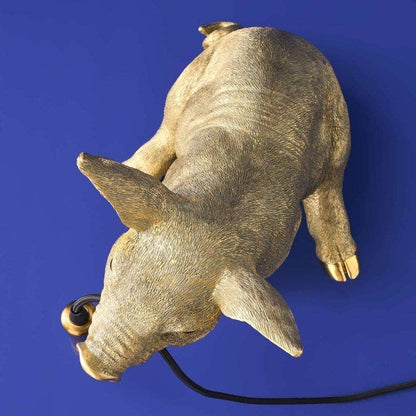 Lampada da tavolo a forma di maiale dorato