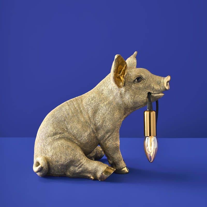 Lampada da tavolo a forma di maiale dorato