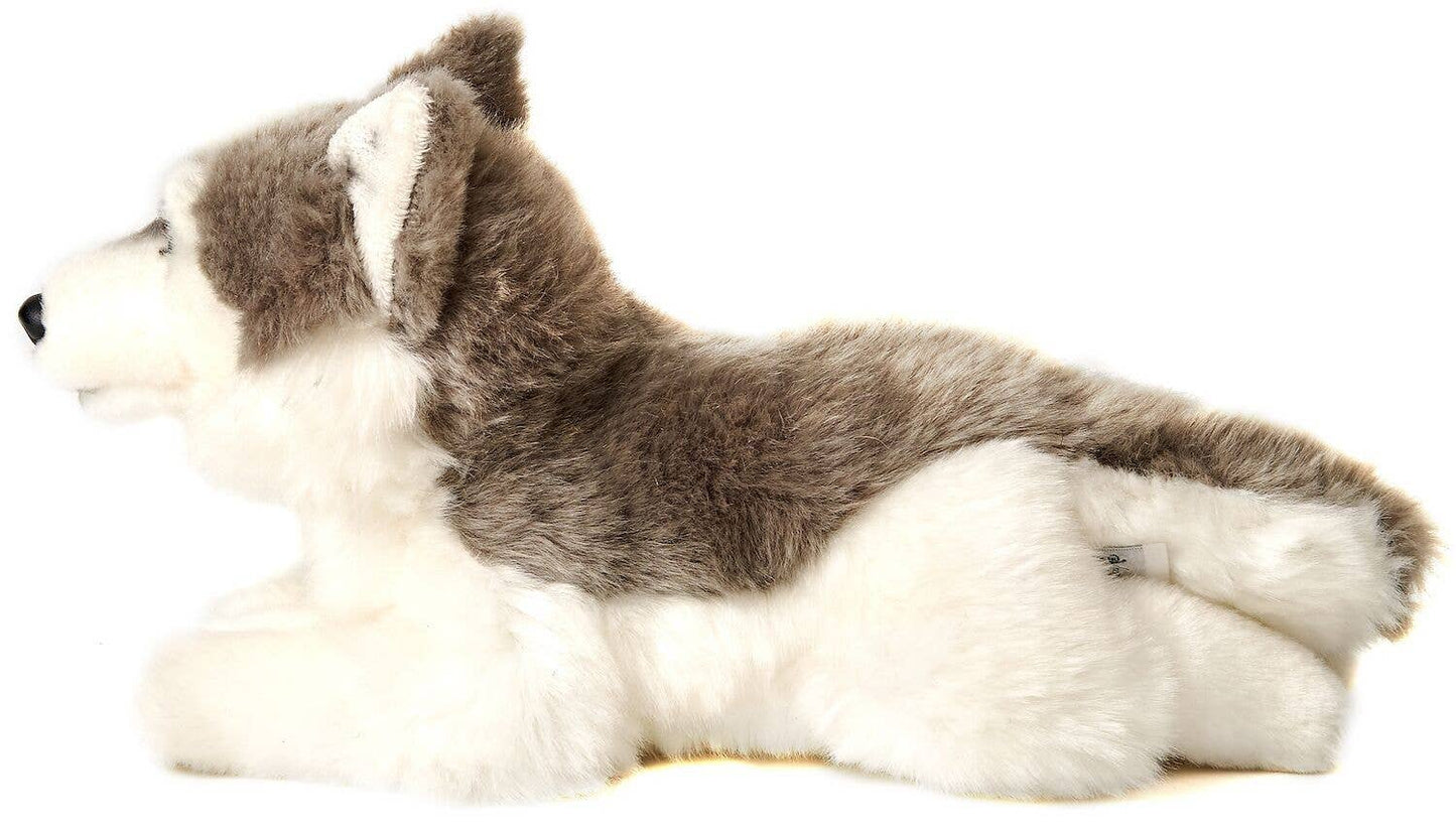Peluche de husky gris, acostado