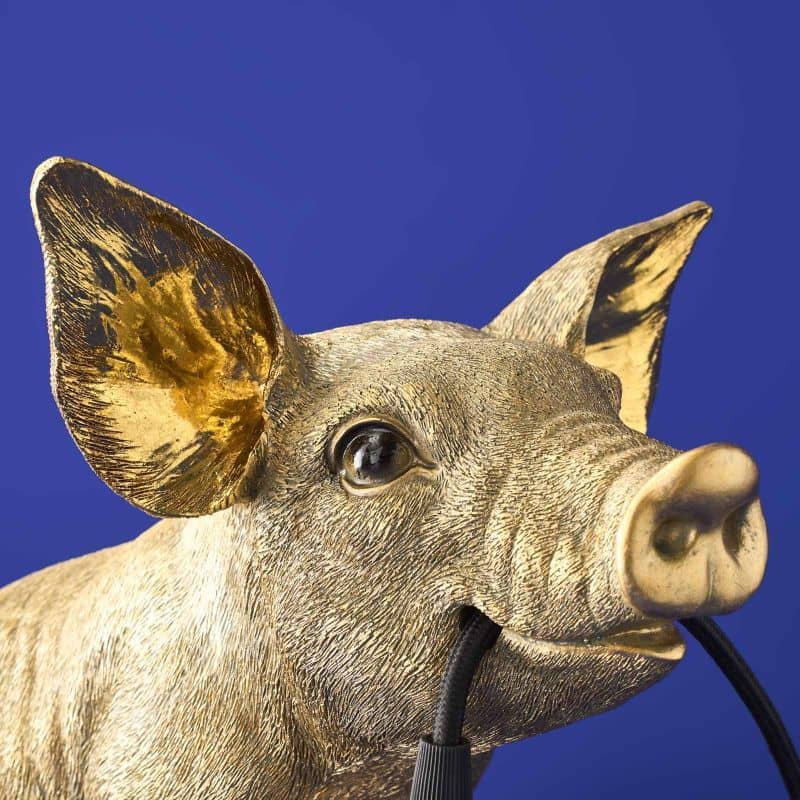 Lampada da tavolo a forma di maiale dorato