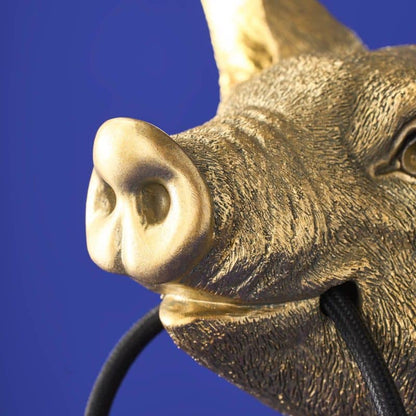 Lampada da tavolo a forma di maiale dorato