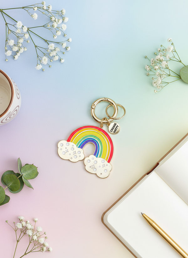 Regenboog sleutelhangertje met de tekst "Kies voor geluk".