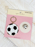 Set di portachiavi e spille sportive