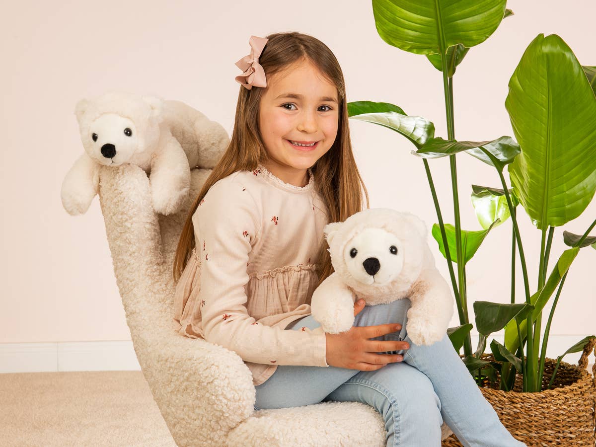 Oso polar de peluche acostado