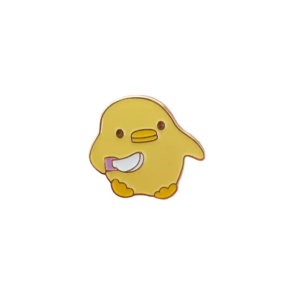 ナイフ付き黄色いアヒルのピン