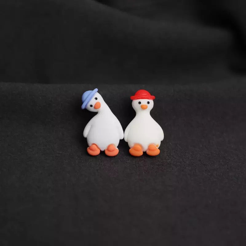 Witte-eendenpin met rode hoed – Canard de Bain