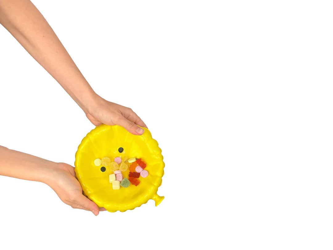 Bandeja para baratijas con globo amarillo triste
